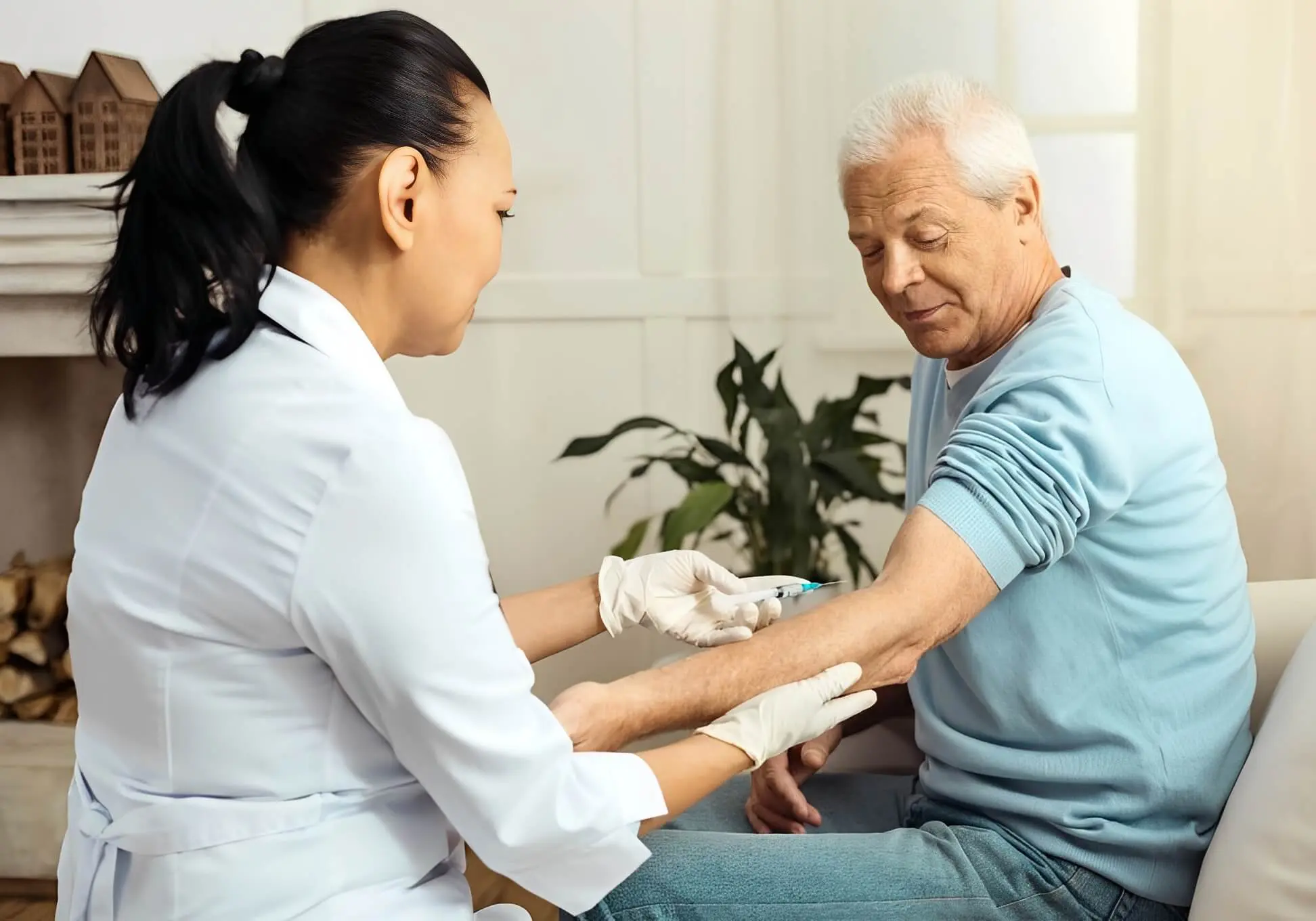 Nurse administering injection to elderly man