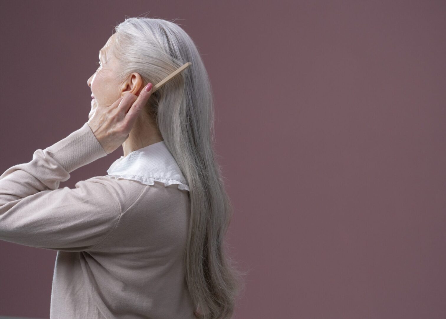 woman combing hair