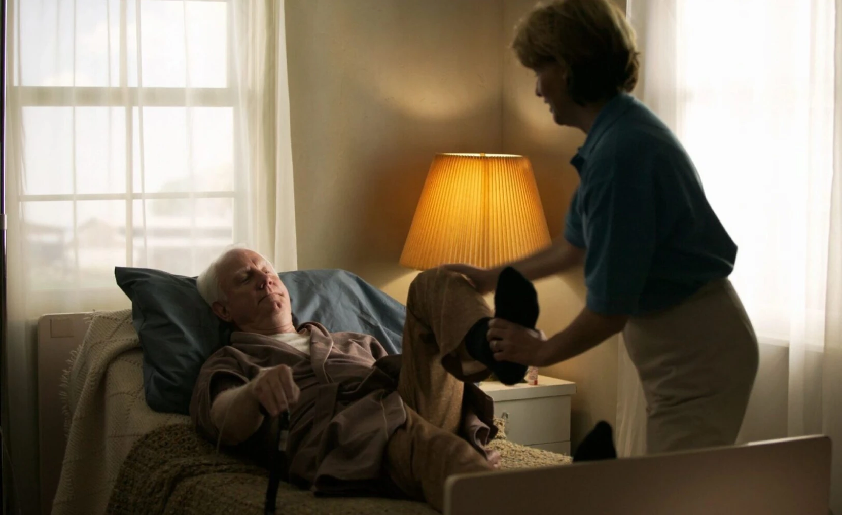 Elderly man receiving care at home